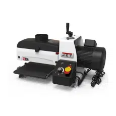 The compact JWDS-1020 benchtop sander from JET packs a powerful 1HP motor that will sand boards up to 3" thick and 20" wide. The innovative patented dust hood ensures dust is funneled to the 4 inch dust port that easily connects to a Dust Collector. Adjusting the table back to parallel is convenient with just the turn of a dial. The self-cooling extruded aluminum sanding drum protects the sanding surface from heat damage, preventing waste.